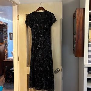 Eva Blue S 6 midi black with violet accents.